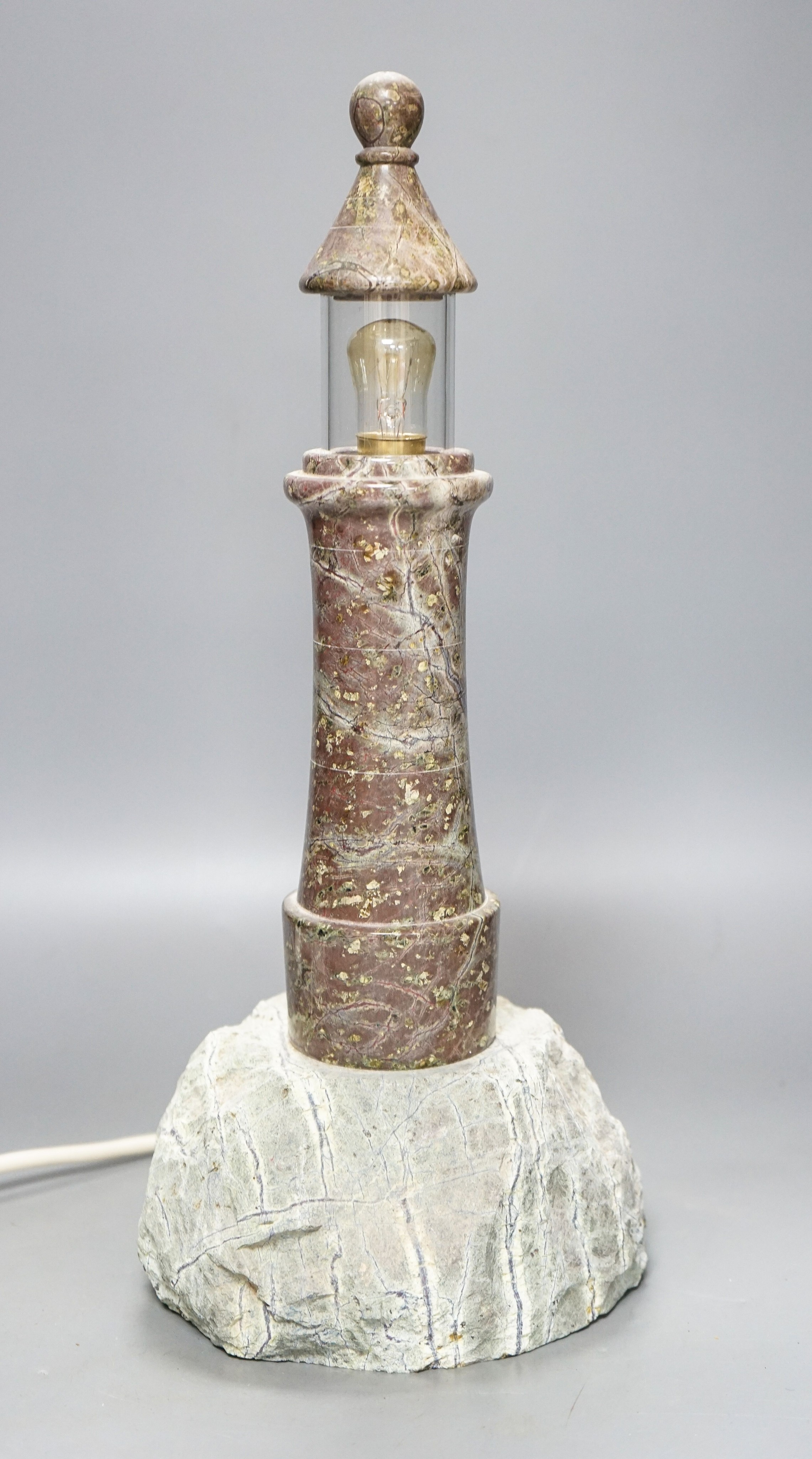 A Cornish serpentine ‘lighthouse’ table lamp 42cm